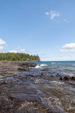 A beautiful view of Split Rock Lighthouse on the rocky coast of Lake Superior. Stock Photos