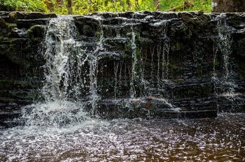 Beautiful view in spring of a waterfall on small river Ivande in Renda, Latvi Stock Photos