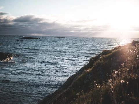 Beautiful View of sun with ocean Stock Photos