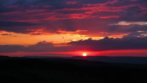 Beautiful view of sunset and clouds moving across the evening sky Stock Footage 284109431