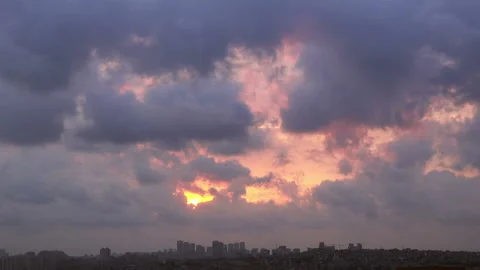 Beautiful view of sunset on the cloudy sky over city Stock Footage 85617958