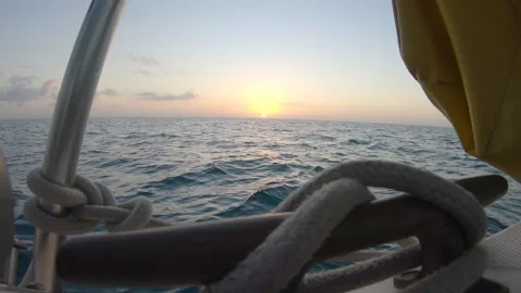 Beautiful View of Sunset over the Gulf of Mexico as viewed from Sailboat Stock Footage 175907126
