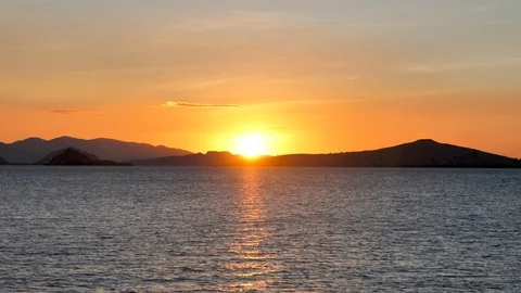 Beautiful View Of Sunset Over Open Blue Ocean, Komodo National Park, Indonesia Stock Footage 98800927