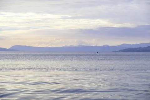 Beautiful view of sunset at Pasir Putih Beach, Lake Toba Stock Photos