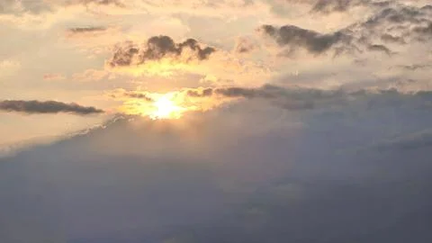 Beautiful view of sunset rays in the sky breaking through the clouds Fotos de archivo