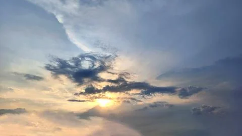 Beautiful view of sunset rays in the sky breaking through the clouds Foto stock