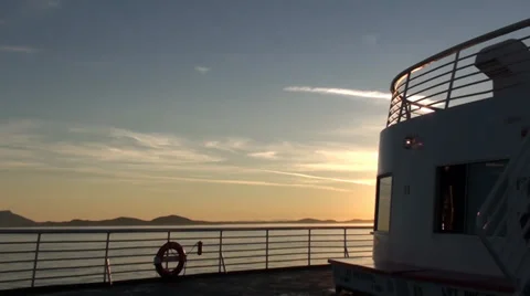 Beautiful View of Sunset at Sea From Deck of Alaska Marine Highway Ferry cursing Stock Footage 32220419