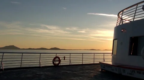 Beautiful View of Sunset at Sea From Deck of Alaska Marine Highway Ferry Stock Footage 32360439