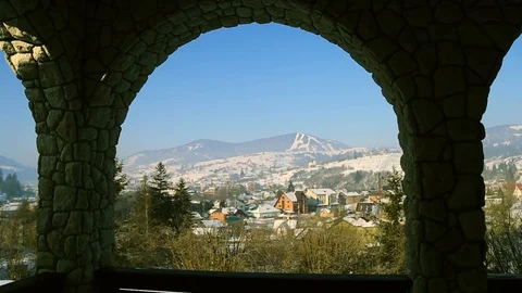 Beautiful view through the arches of the winter city landscape nature aerial 스톡 동영상 105266584