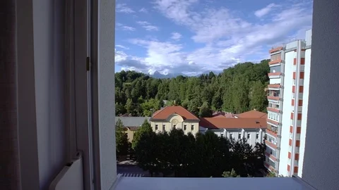 Beautiful view through the home window on the beautiful sky and forest Stock Footage 111017213