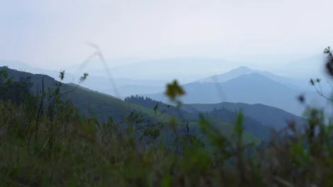 Beautiful view from top of the mountain through the grass 動画素材 90945548