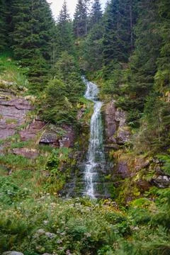 A beautiful view of the upper cascade of waterfall Tri Kladenca on Dojkinacka Stock Photos