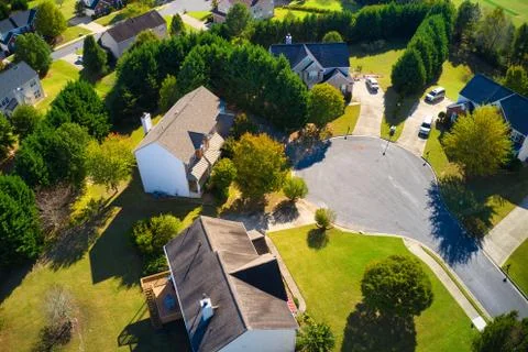 Beautiful view of an upscale sub division with golf course and a pond in suburbs Fotos Stock