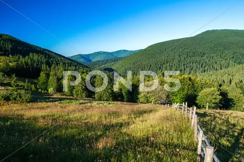 Beautiful view of village in Ukrainian Carpathian mountains Stock Photos