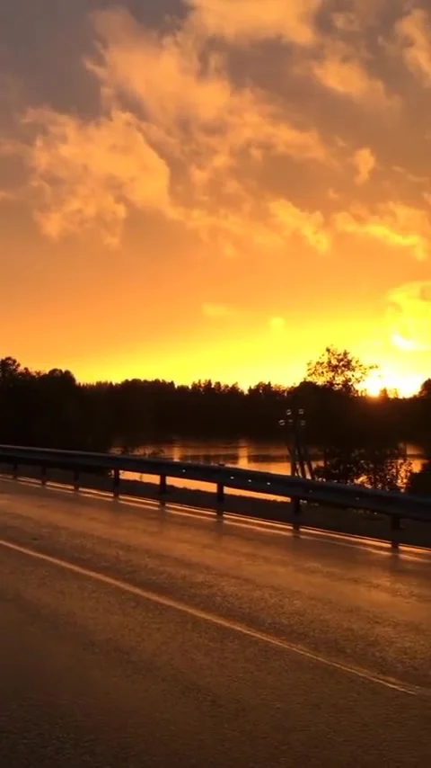 Beautiful view while driving to see the sunset 動画素材 243855311