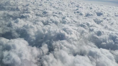 Beautiful view of white fluffy clouds from above. 스톡 동영상 336940585