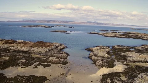Beautiful views to Skye, Rum, Eigg from Arisaig. Aerial 4K. Stock Footage 102808916