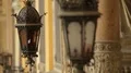Beautiful vintage lamps hanging on medieval building, ancient architecture HD Footage