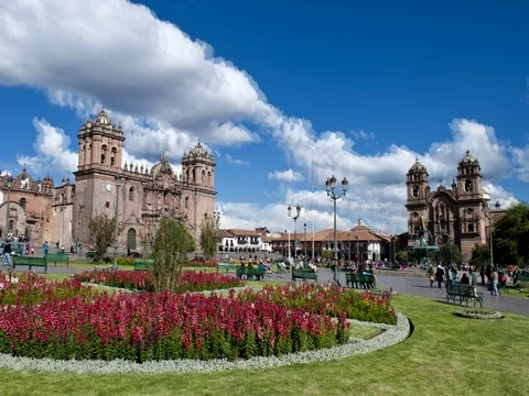 Beautiful visual image of Main Square thru flowers in sunshine of Cusco Cuzco Stock-Footage 75687934