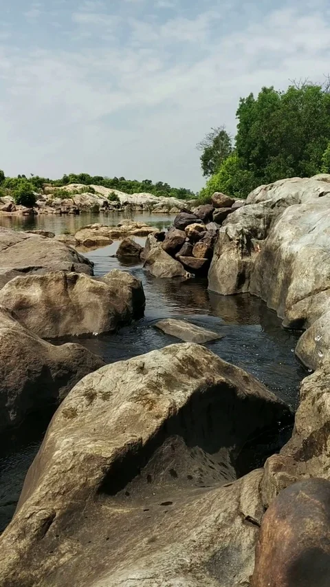 Beautiful water between Rocks Stock Footage 127476322