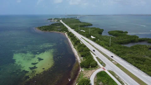 Beautiful water off both sides of the road in the Florida Keys 2026 Summer Stock Footage 344059861
