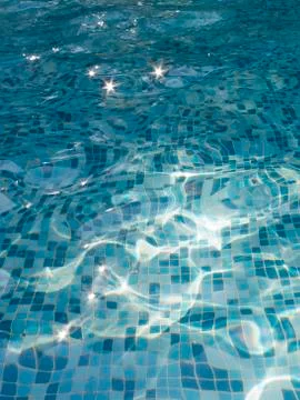 Beautiful water in the pool with mosaics Stock Photos