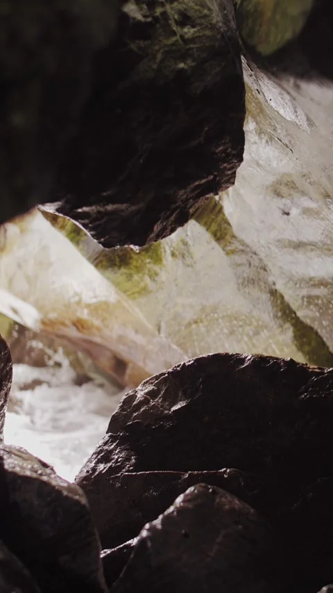Beautiful water splashes in slow motion. Sea waves and rocks. Stock Footage 320997918