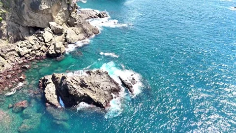 Beautiful Water Surface | Waves on Rocks | Izu - 4K Aerial Video Video stock 328983064
