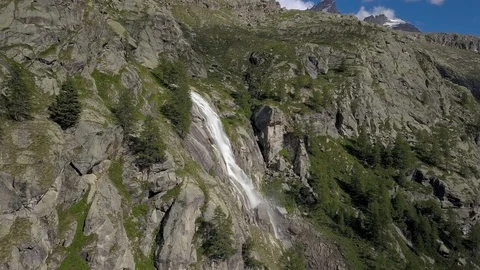 Beautiful waterfall in the alps Stock Footage 113042859