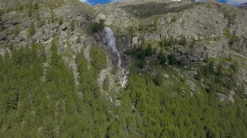 Beautiful waterfall in the Alps Stock Footage 113200570