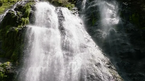 A beautiful waterfall among the rainforest. Stock Footage 235402677