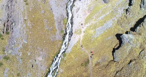 Beautiful waterfall between rocks on a mountainside Stock Footage 147101651