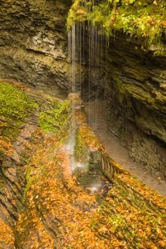 Beautiful waterfall cascade and fall foliage Stock Photos