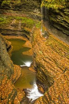 Beautiful waterfall cascade and fall foliage 스톡 사진