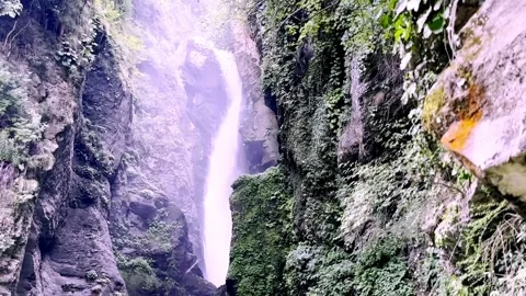 Beautiful Waterfall Cascading Through Scenic Natural Landscape Видео 339528511
