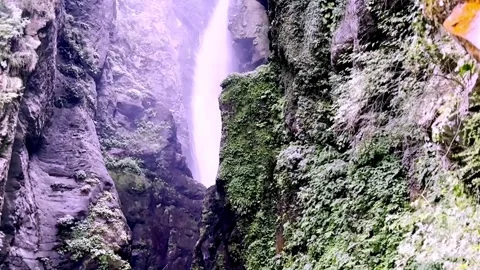 Beautiful Waterfall Cascading Through Scenic Natural Landscape Видео 339528536