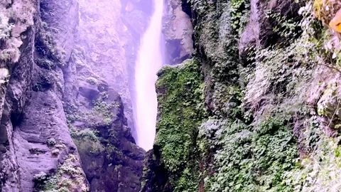 Beautiful Waterfall Cascading Through Scenic Natural Landscape Видео 339528540