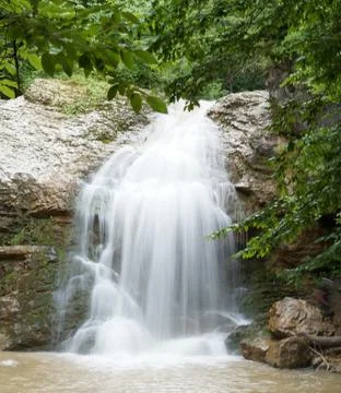 Beautiful waterfall in a dense forest Foto stock