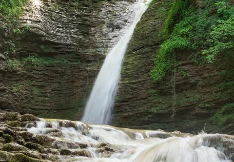 Beautiful waterfall in a dense forest Stock Photos