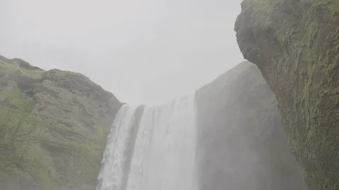 Beautiful waterfall falling from the mountain Stock Footage 69741850