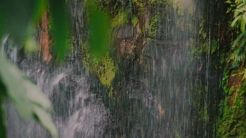Beautiful waterfall flowing between rocks Stock Footage 116417805