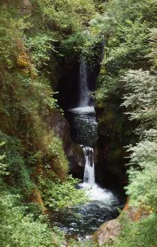 Beautiful waterfall in the forest of P.N. of Saja-Besaya in Cantabria, Spain Stock Photos