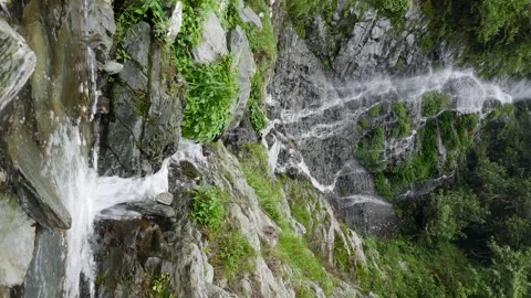 Beautiful waterfall in green forest. Small waterfall with crystal clear water Stock Footage 314119480