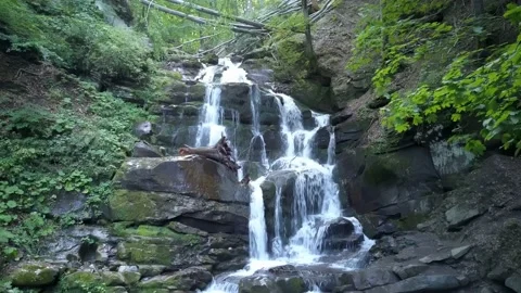 Beautiful waterfall in green forest, top view Stock Footage 233379836