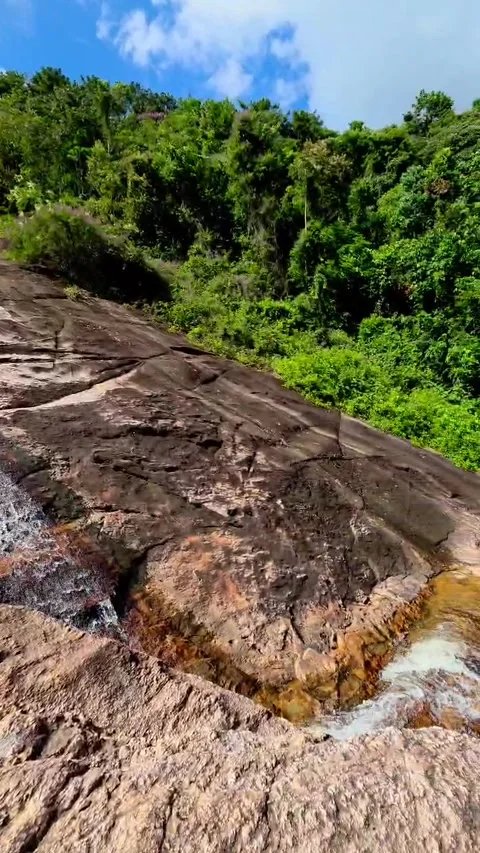 Beautiful waterfall with a huge drop. Stock Footage 329077344