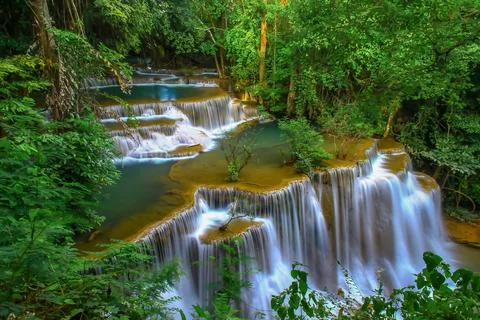 Beautiful waterfall in the middle of rainforest. Stock Photos