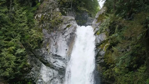 Beautiful waterfall in mountains in Canada, British Columbia Видео 82442544
