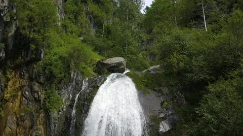 Beautiful waterfall in the mountains 動画素材 66303224
