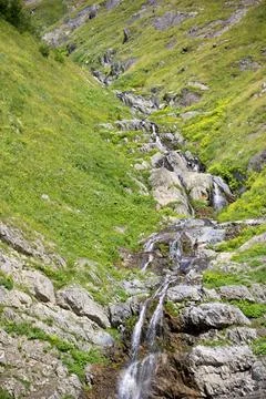 Beautiful waterfall in the mountains. Stock-Fotos