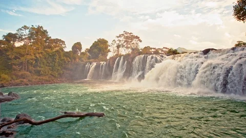 Beautiful waterfall panoramic sunset view slow motion seamless loop Stock Footage 101270142